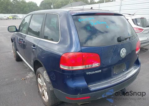 2006 Volkswagen Touareg V8 z USA, uszkodzony, nr VIN WVGZM77L86D020255
